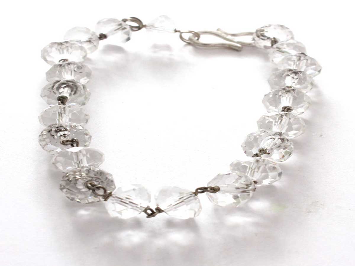 A lucky charm bracelet made of faceted crystal beads