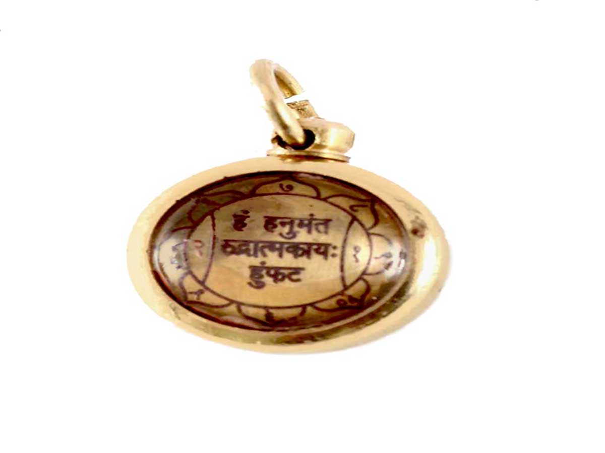 The Hanuman Yantra amulet worn as a locket for strength and protection