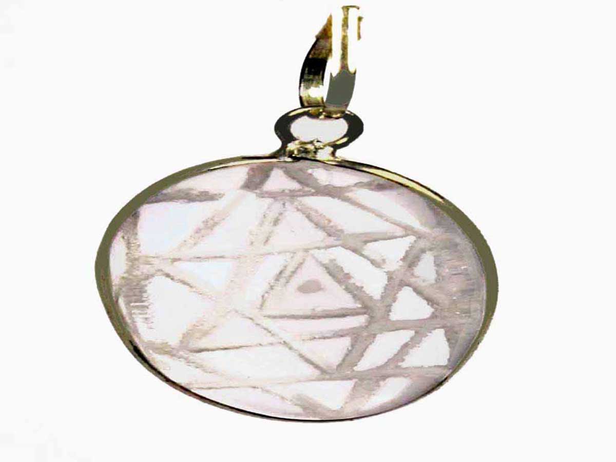 A crystal Shri Yantra locket